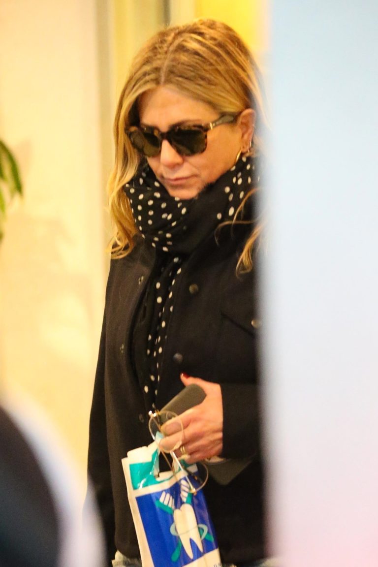 Jennifer Aniston Christmas shopping in Los Angeles GotCeleb